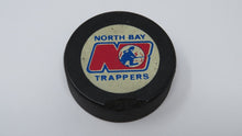 Load image into Gallery viewer, Vintage North Bay Trappers Game Used OHA Official Viceroy Hockey Puck Ontario